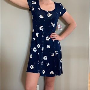 Navy blue floral print jersey knit dress